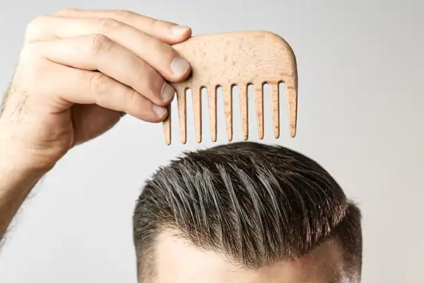 Comb through hair