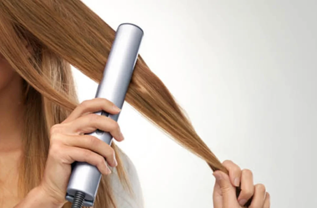 What causes frizzy hair: Excessive use of hot styling tools