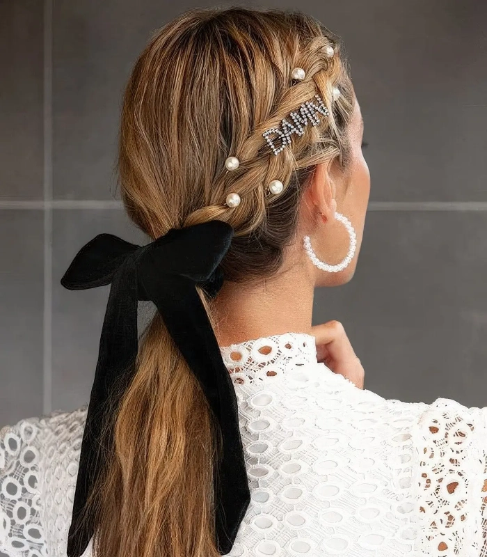 Pearl-studded low braid