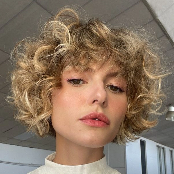 Curly hair bob with bangs