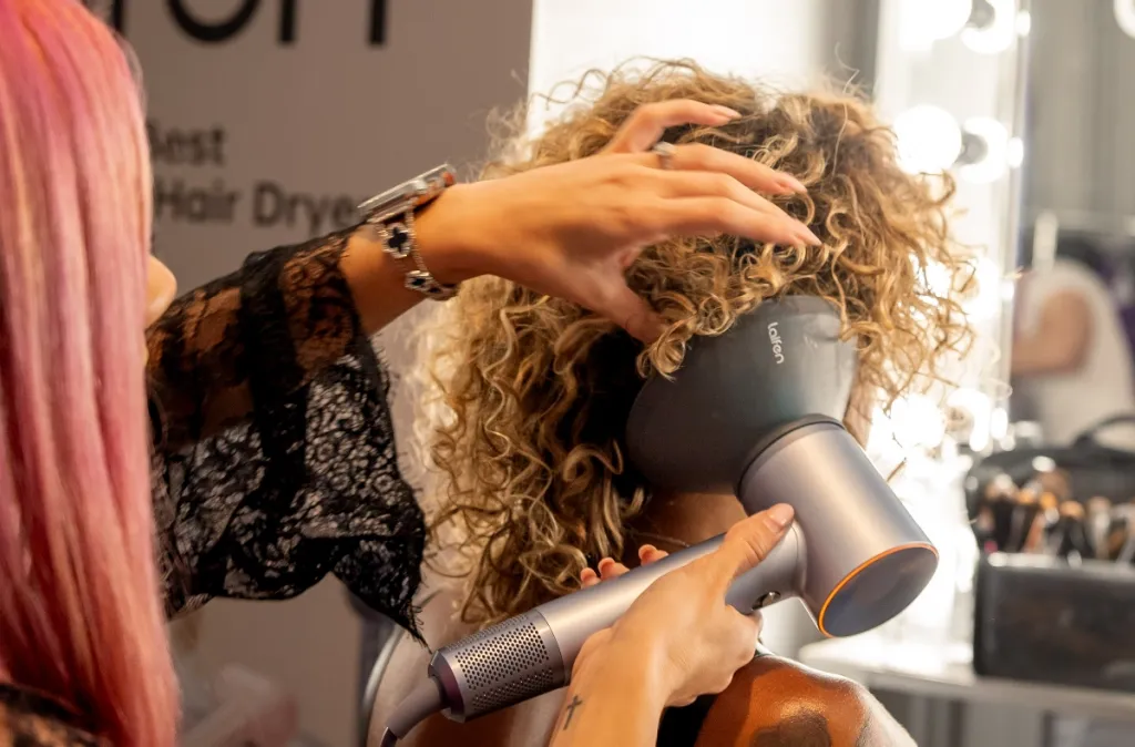 Use a diffuser to dry your curly hair fast