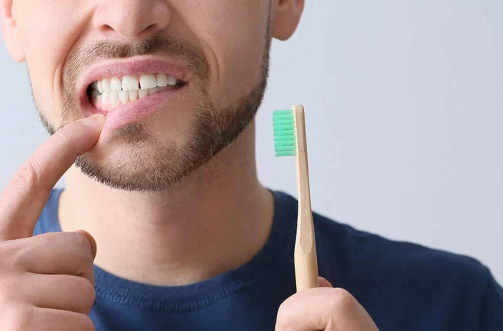 A hard-bristle toothbrush head