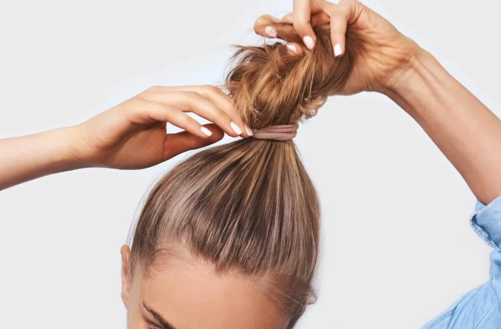 Avoid tight hairstyles to prevent dry, thin hair