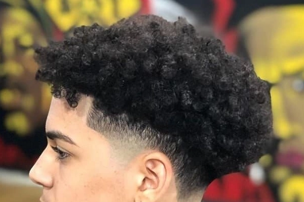 Blowout taper fade for curly hair