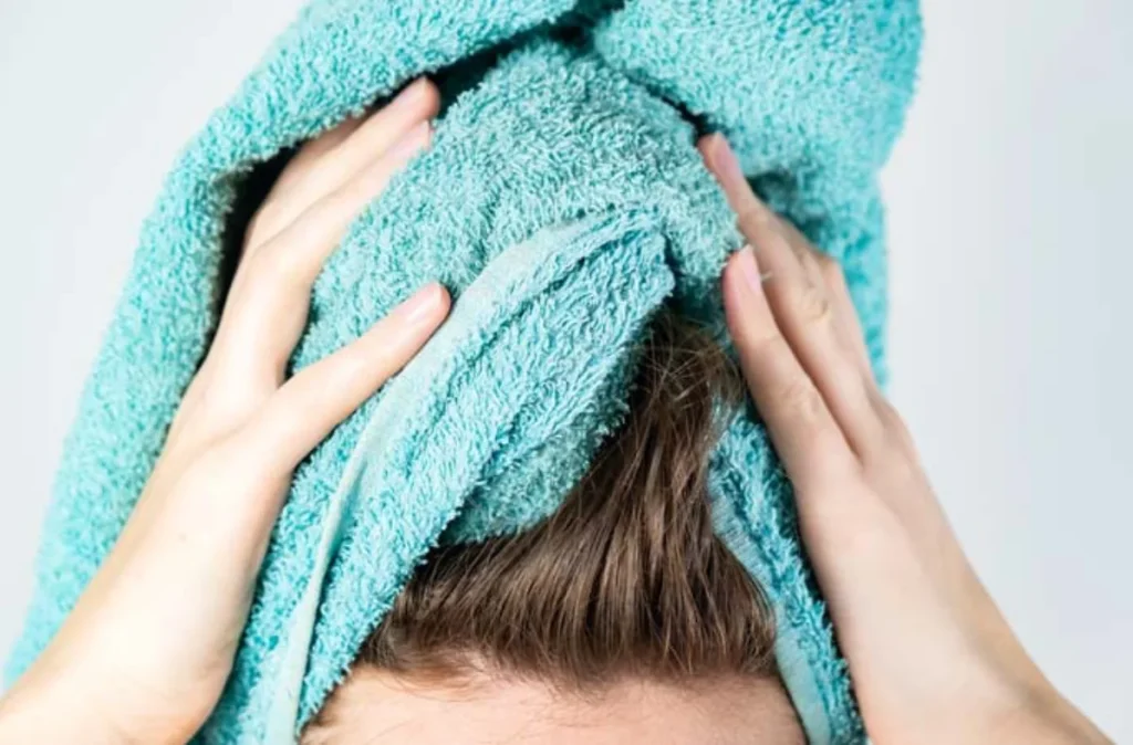 Dry your hair with a towel