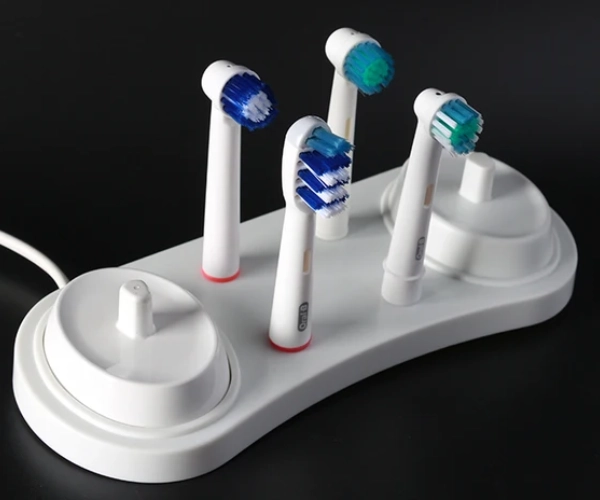 Toothbrush head holder