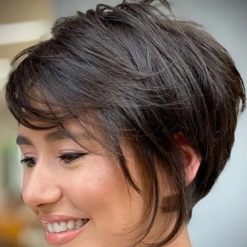 Layered pixie bob haircut with fringe