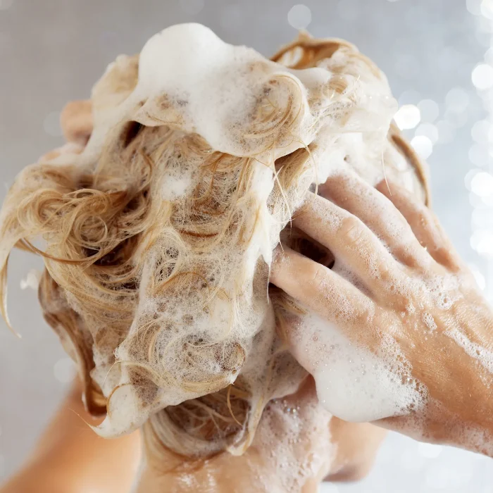 Wash your hair with a nourishing shampoo and conditioner 