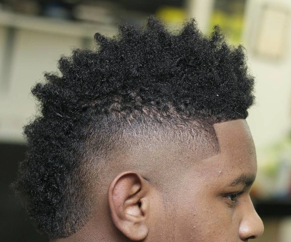 Curly mohawk hairstyle for men