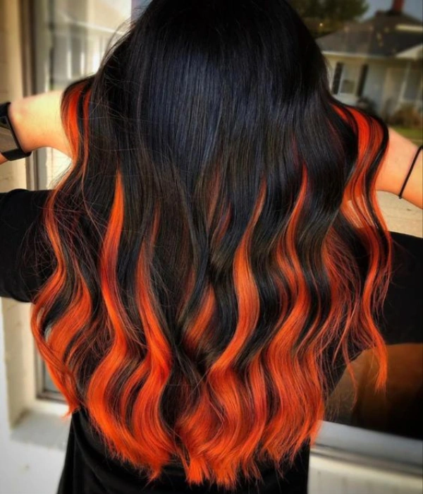 Black with fiery orange highlights | Halloween hair color ideas